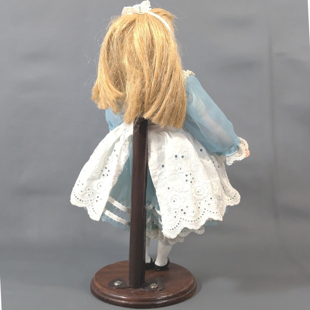 Alice in Wonderland Porcelain Doll 11.5 In. Bisque Blue Dress Eyelet Apron Stand - Picture 3 of 6
